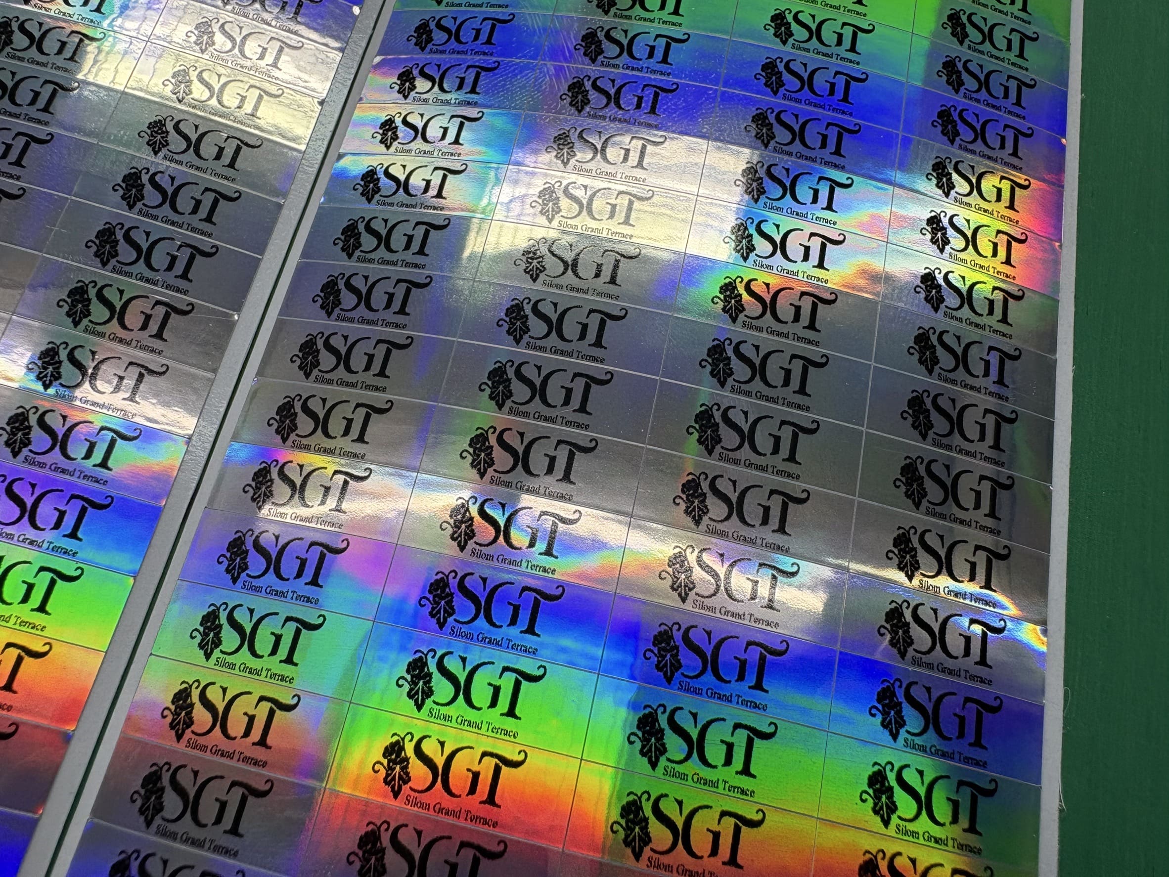 ฉลากกันปลอมโฮโลแกรมพร้อมโลโก้